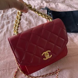 Used. 1.5 YO. No visible scratches. Gold hardware.